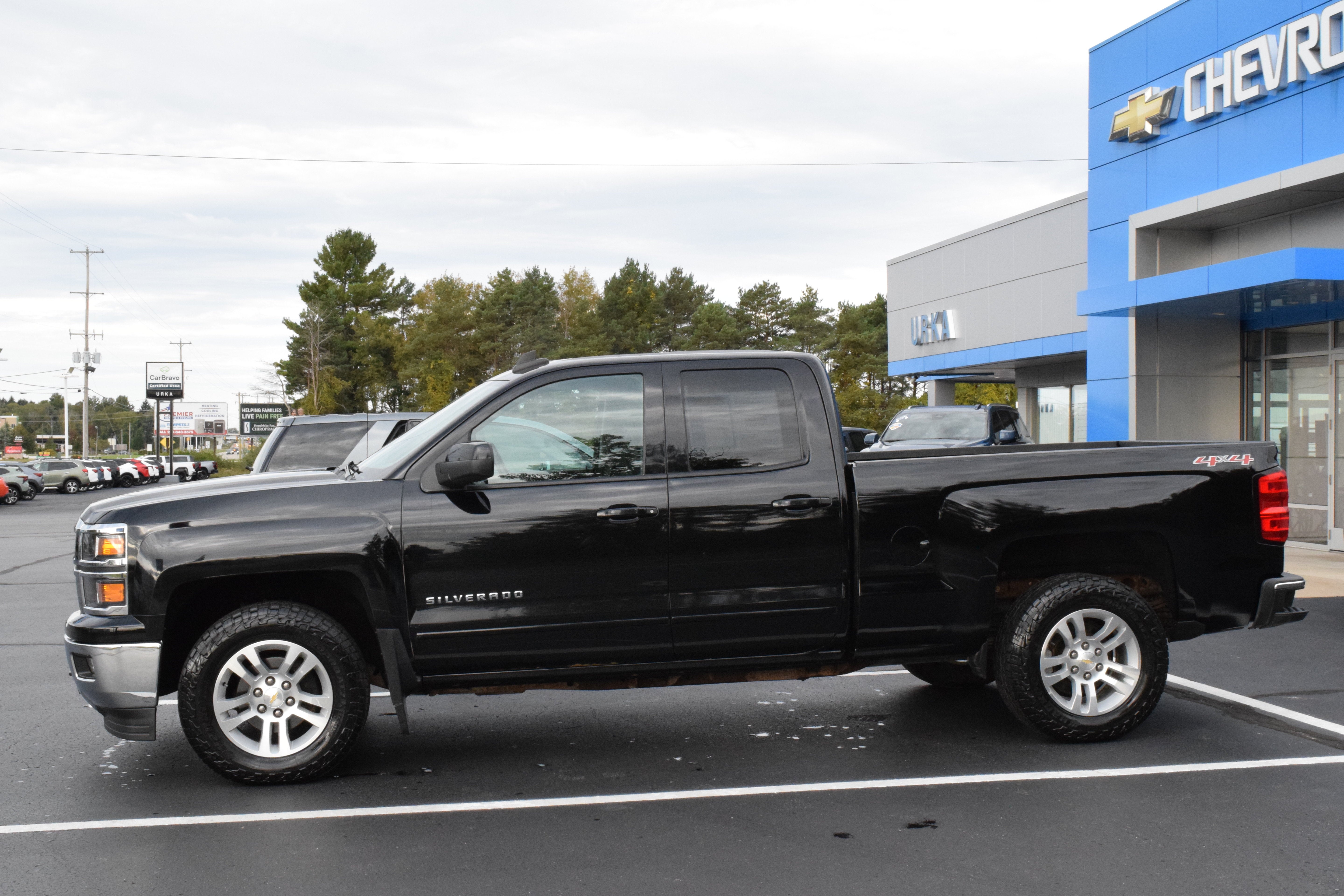 Used 2015 Chevrolet Silverado 1500 LT with VIN 1GCVKREC6FZ410295 for sale in Ludington, MI