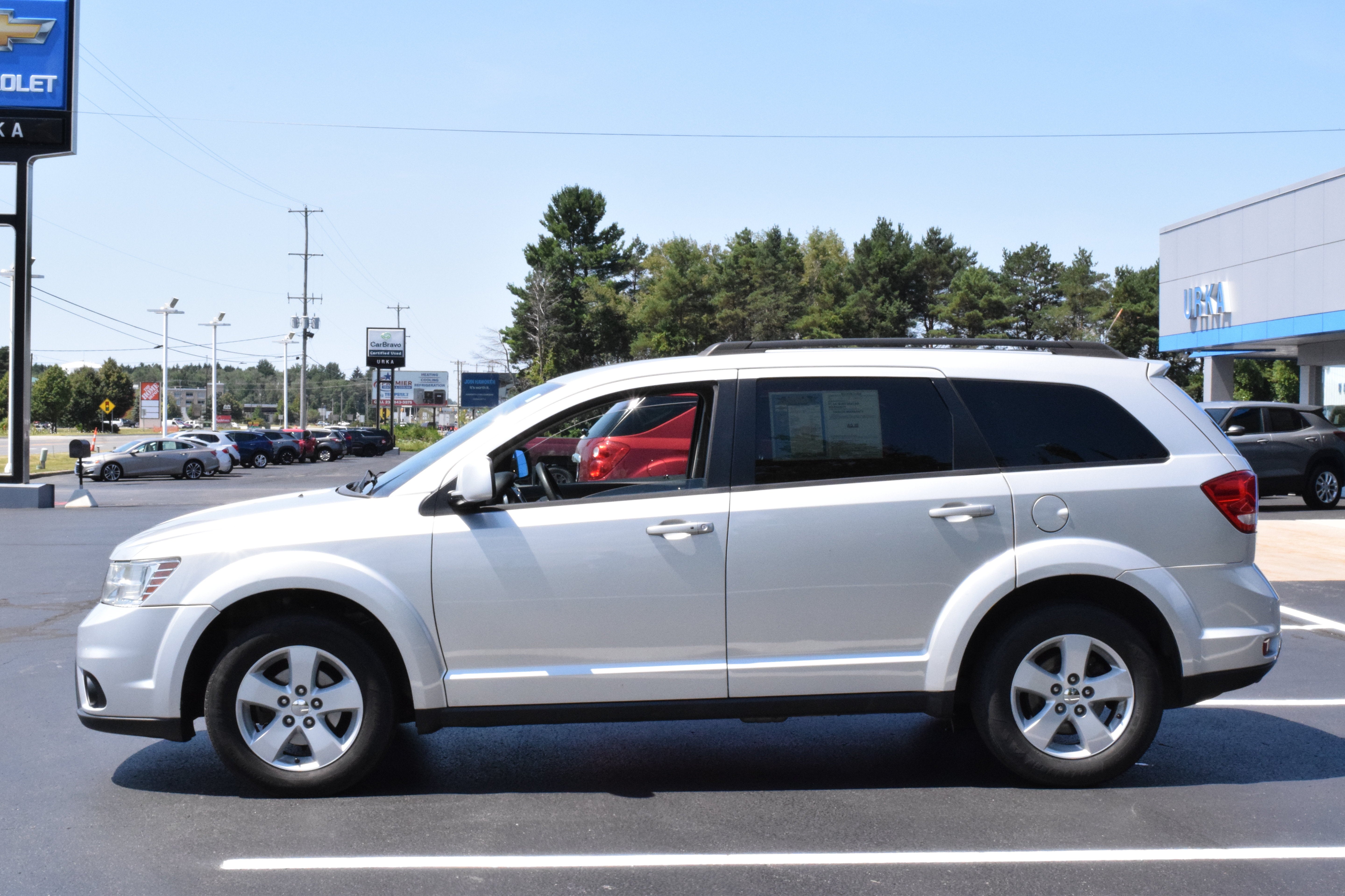 Used 2012 Dodge Journey SXT with VIN 3C4PDCBG4CT296243 for sale in Ludington, MI