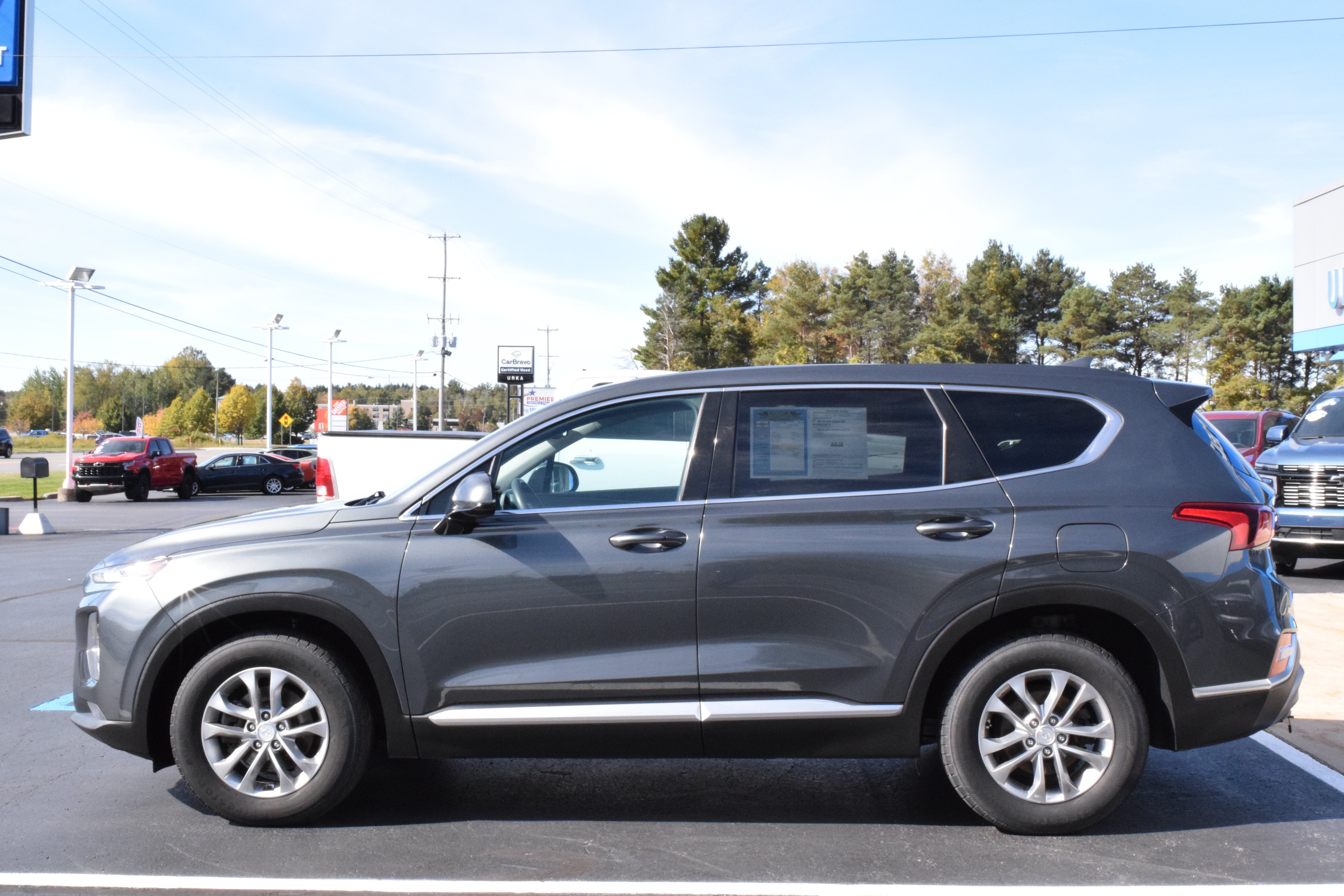 Used 2020 Hyundai Santa Fe SEL with VIN 5NMS3CAD2LH148545 for sale in Ludington, MI